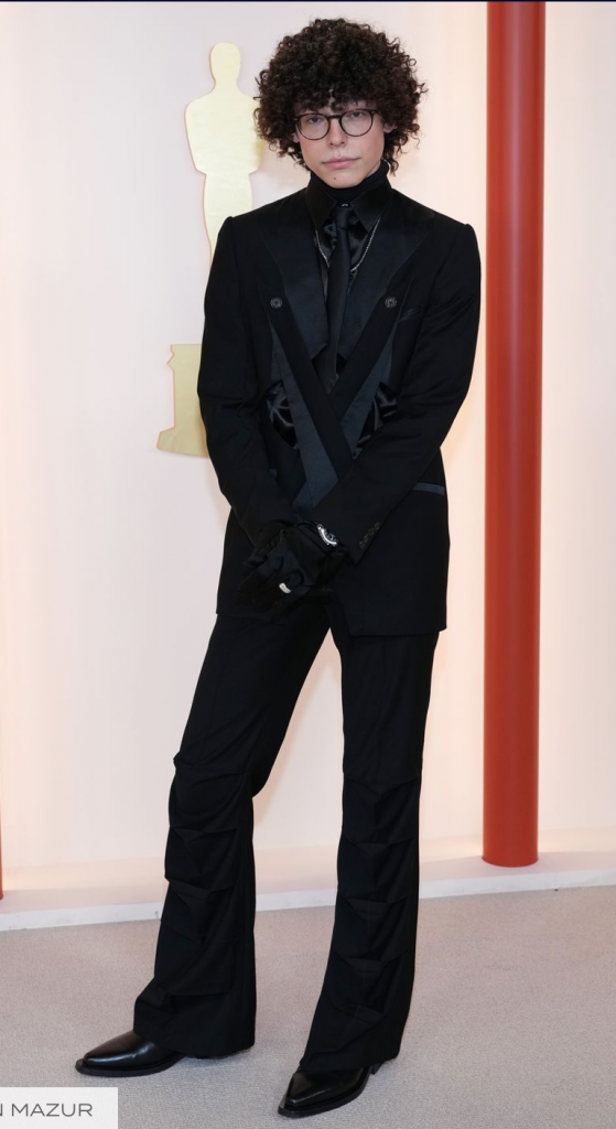 Marcus Rashford Rocks Green Jacket at Louis Vuitton's Spring